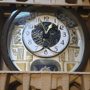 Elegant Brown and Gold Wall Clock